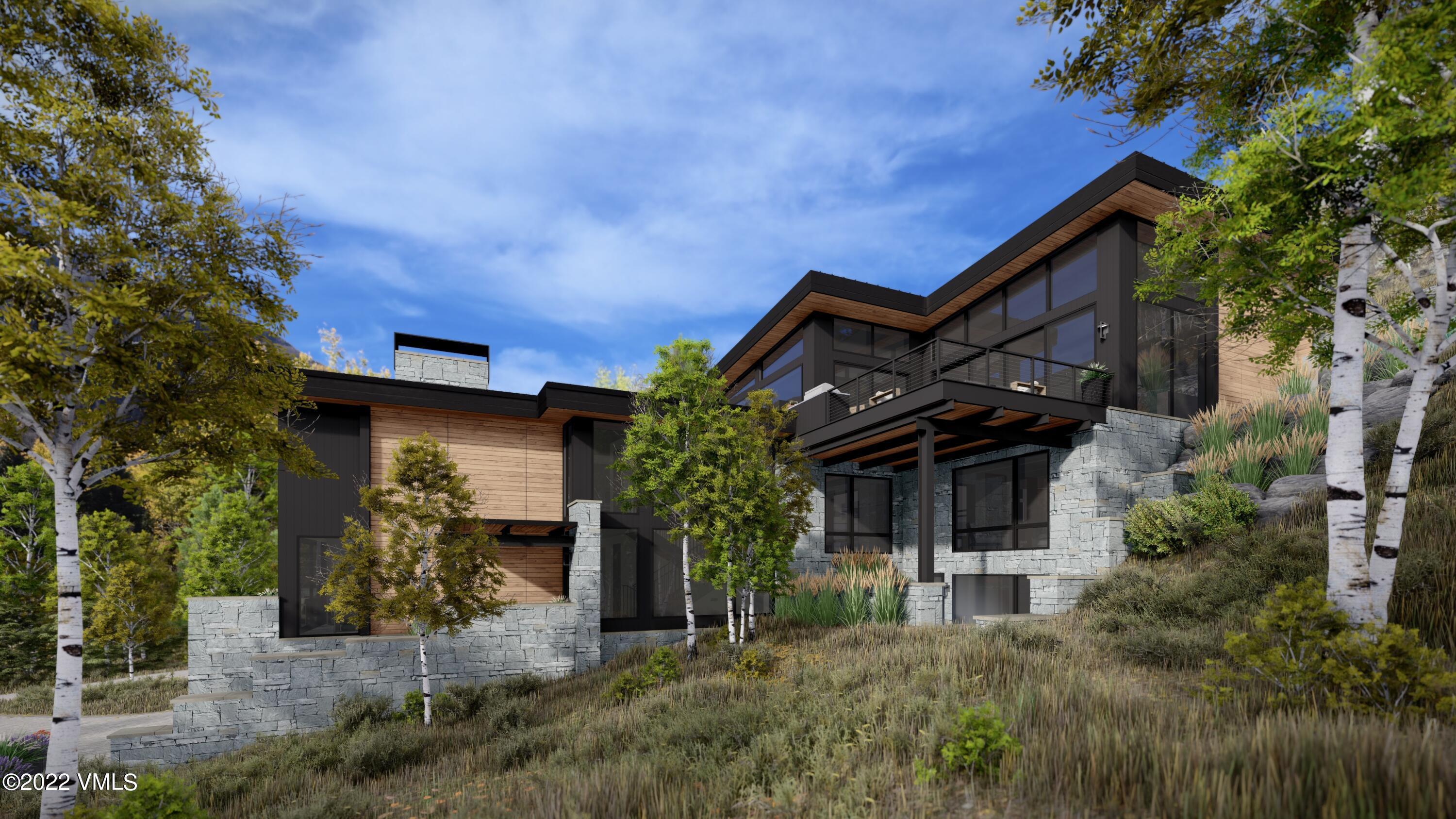 2965 Manns Ranch Road Vail, CO 81657 - Photo 22 of 26 a house that has a tree in front of the house