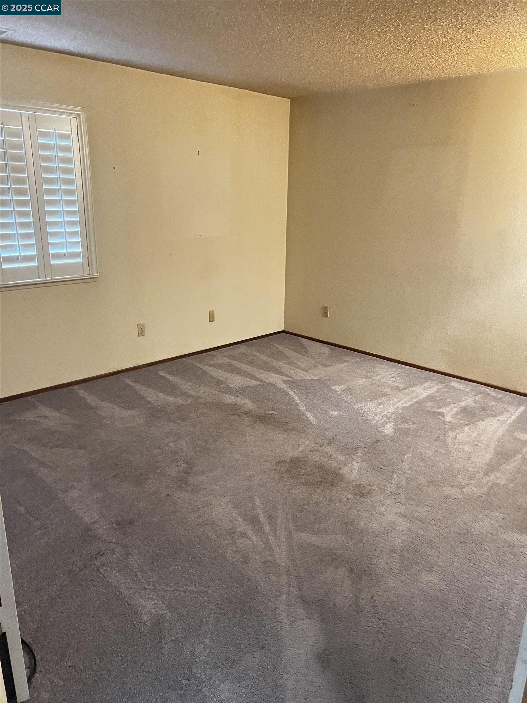 309 Devonwood Hercules, CA 94547 - Photo 13 of 26 a view of an empty room with a window
