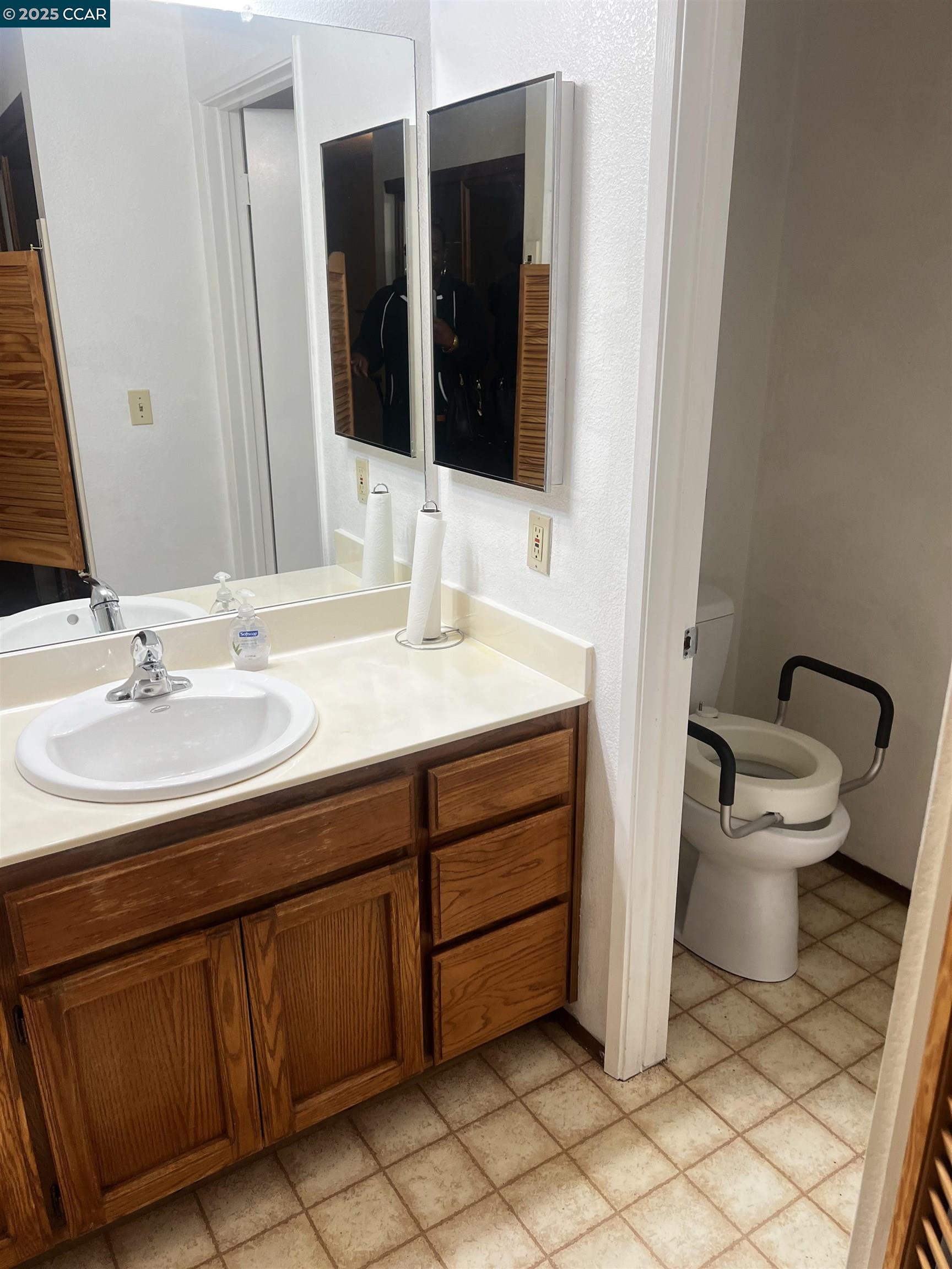 309 Devonwood Hercules, CA 94547 - Photo 15 of 26 a bathroom with a sink and a mirror