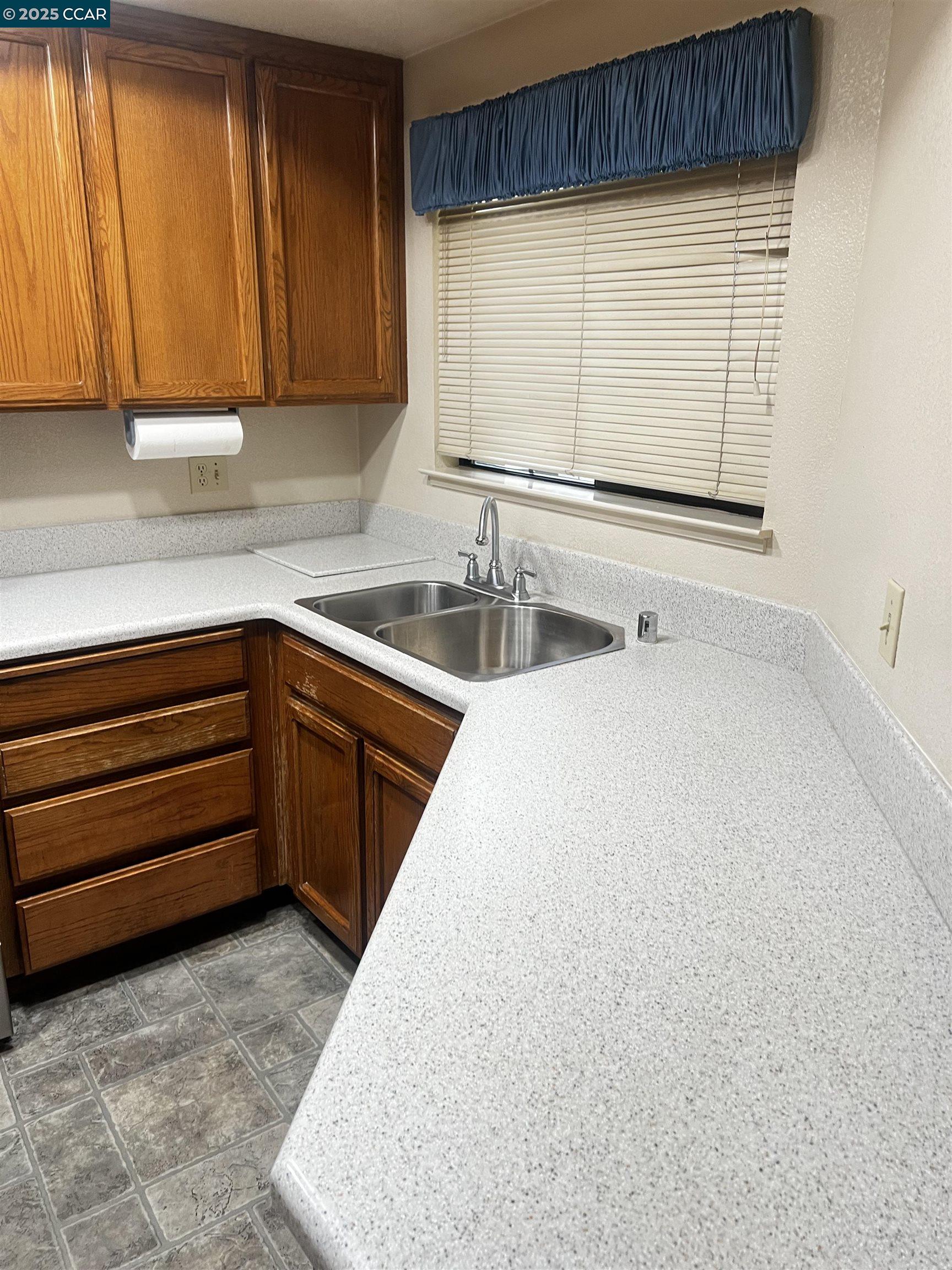309 Devonwood Hercules, CA 94547 - Photo 26 of 26 a view of a kitchen with sink and window