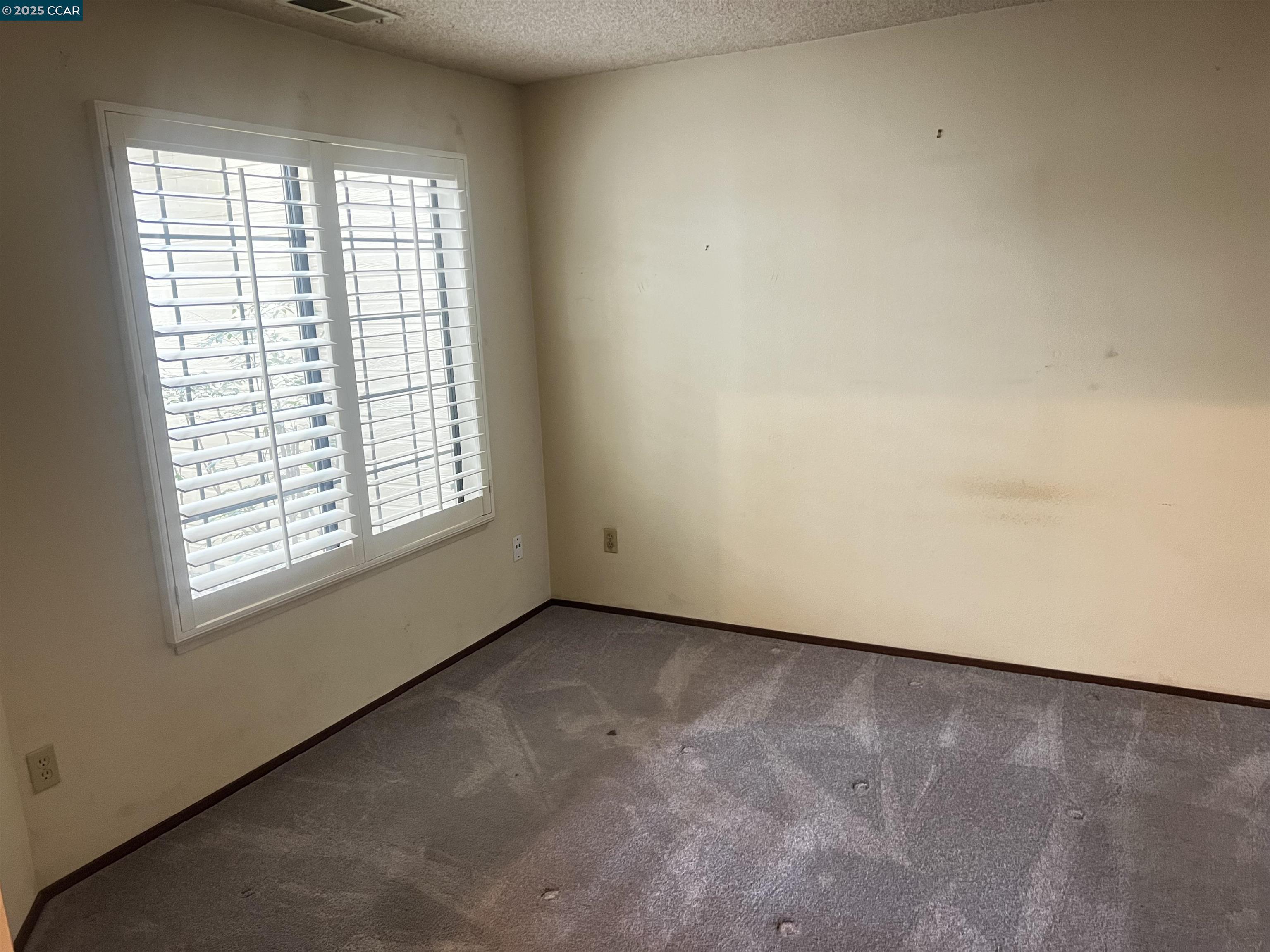 309 Devonwood Hercules, CA 94547 - Photo 5 of 26 an empty room with a window