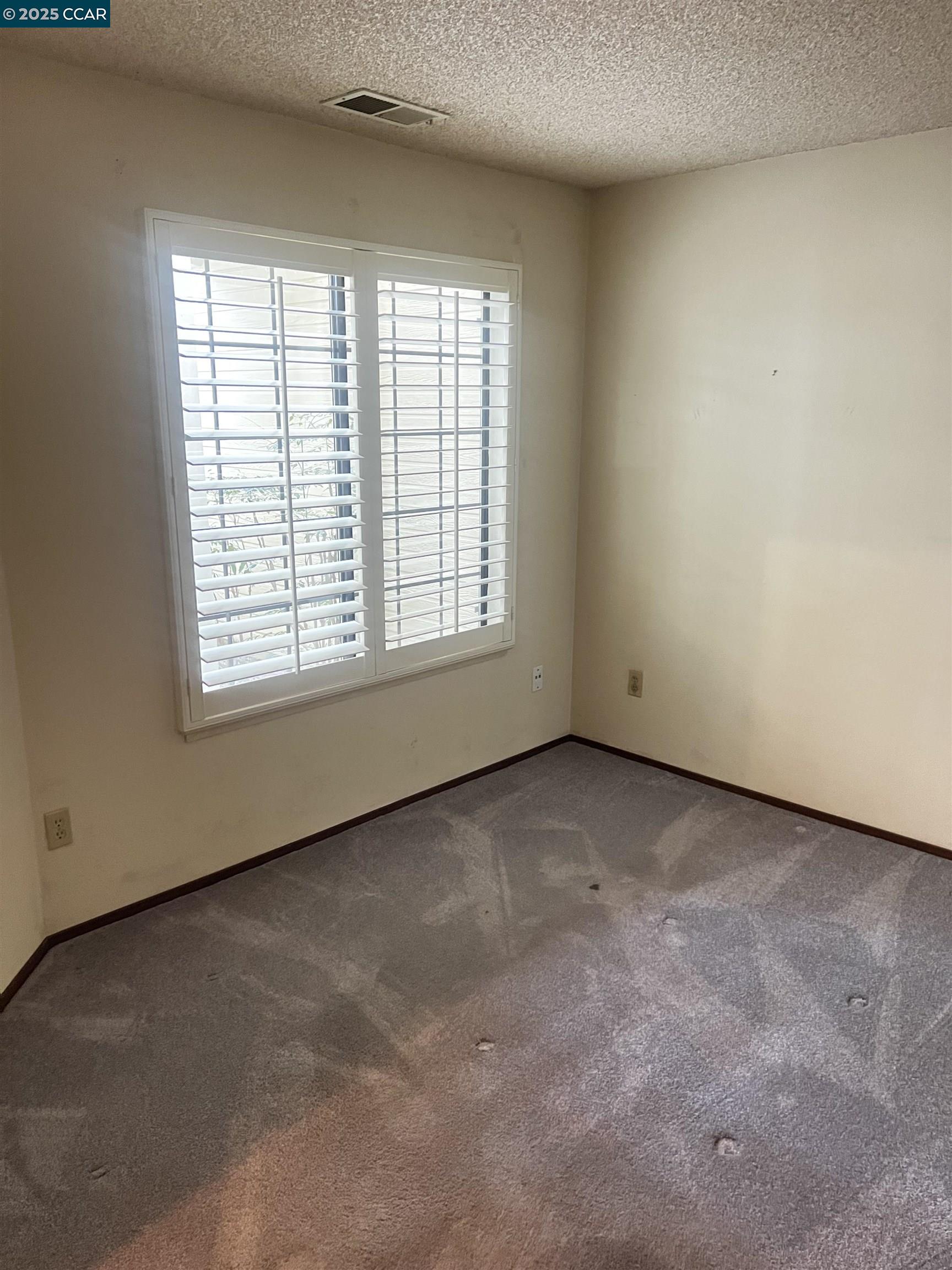309 Devonwood Hercules, CA 94547 - Photo 8 of 26 an empty room with a window