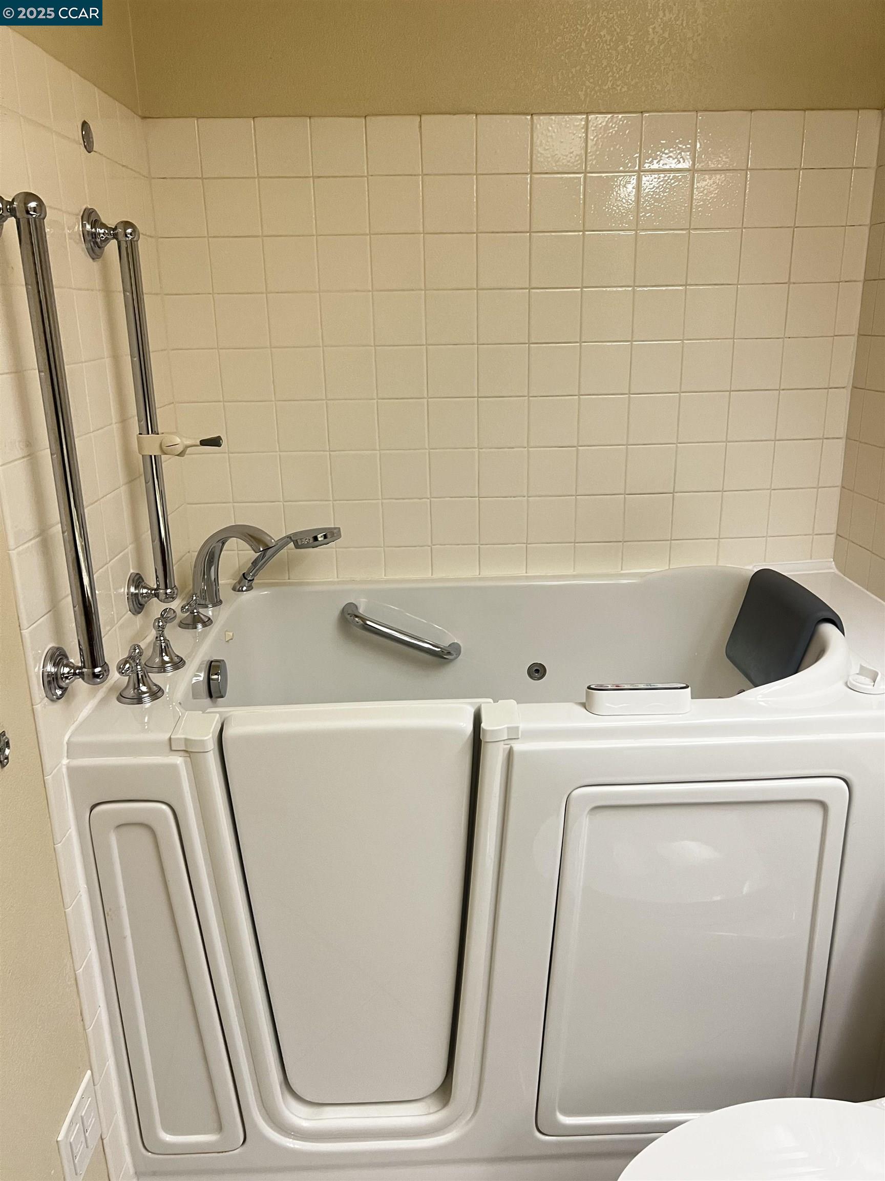 309 Devonwood Hercules, CA 94547 - Photo 9 of 26 a bathroom with a sink and a washer dryer