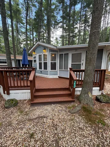 a front view of a house with a porch