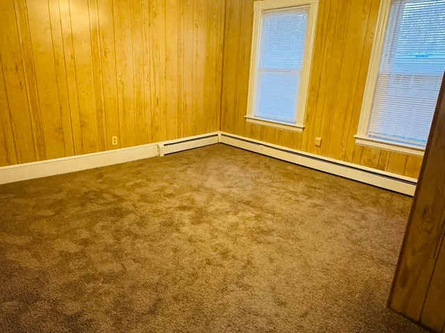 a view of a room with a window