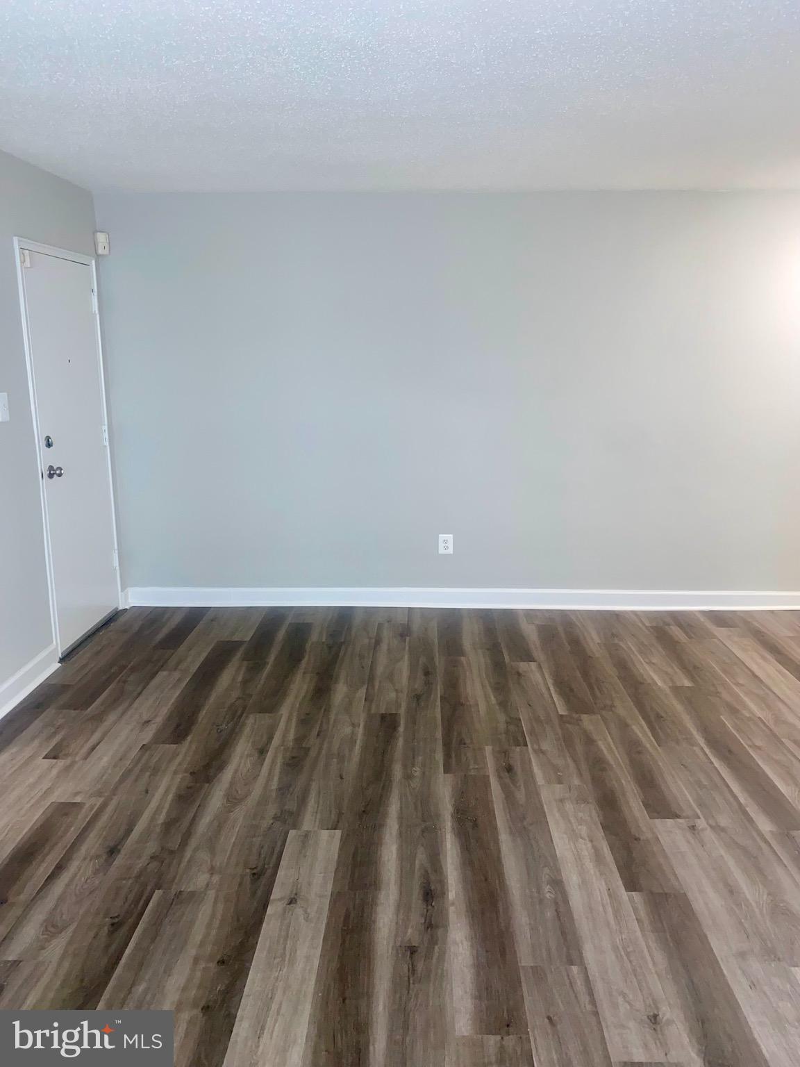 718 Brandywine Street Southeast, Unit 202 Washington, DC 20032 - Photo 2 of 10 a view of a room