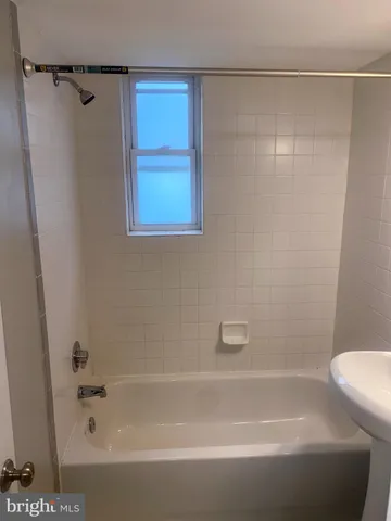 a bathroom with a bathtub