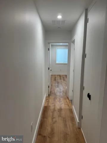 a bathroom with a toilet and shower