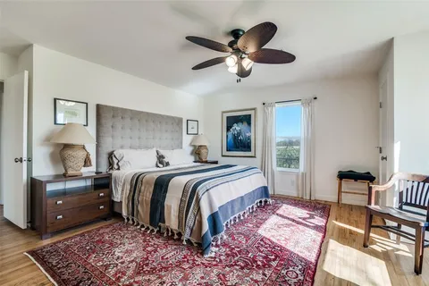 a bed room with a bed and a couch