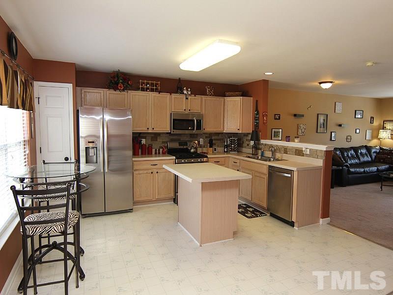 5119 Neuse Commons Lane Raleigh, NC 27616 - Photo 3 of 22 Large kitchen with stainless steel appliances!