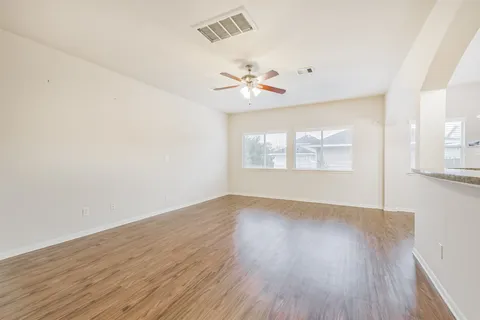 a kitchen with stainless steel appliances granite countertop a stove and a sink