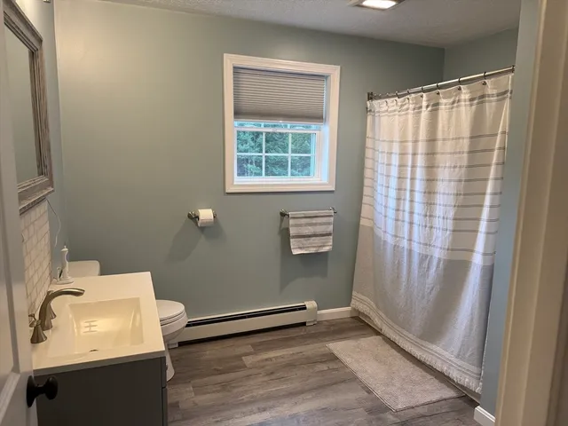 a bathroom with a sink and a shower