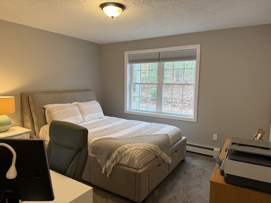 288 Chase Road Athol, MA 01331 - Photo 16 of 24 a bedroom with a bed and window