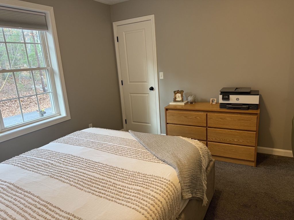 288 Chase Road Athol, MA 01331 - Photo 17 of 24 a bedroom with a bed and a window
