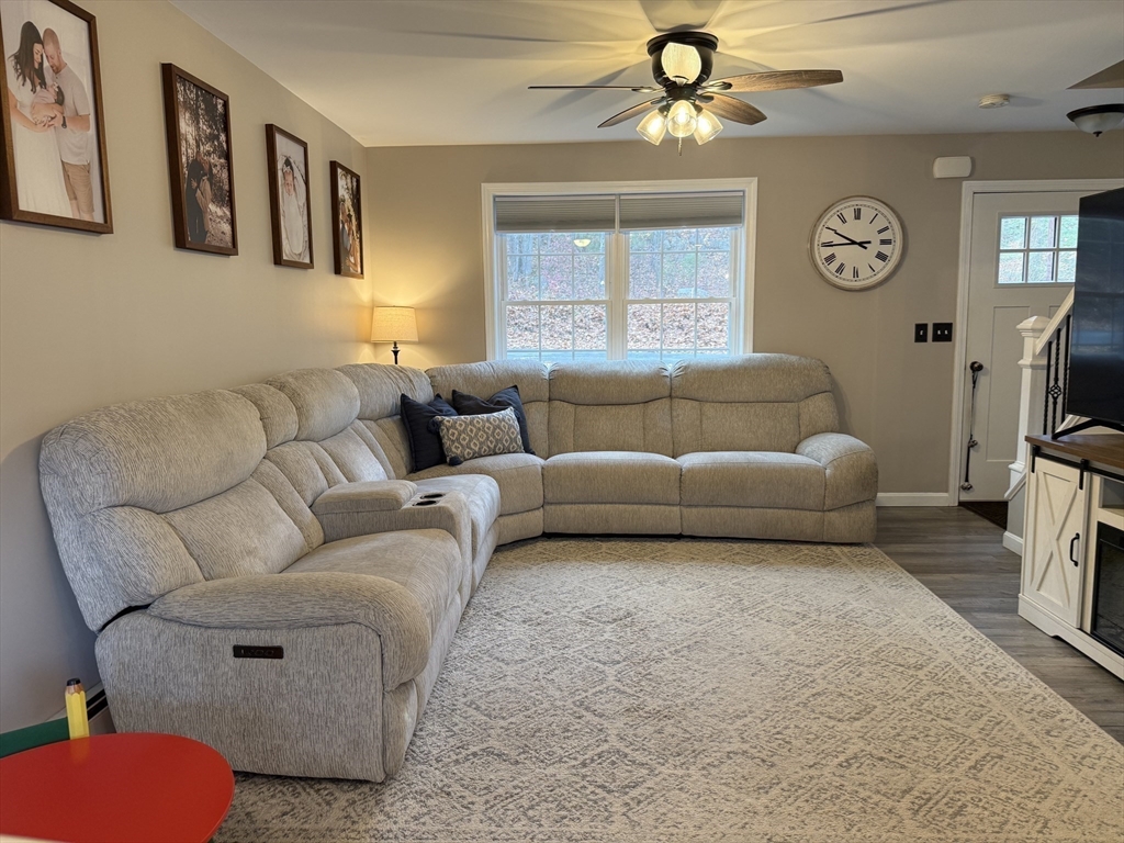 288 Chase Road Athol, MA 01331 - Photo 7 of 24 a living room with furniture a ceiling fan and a window