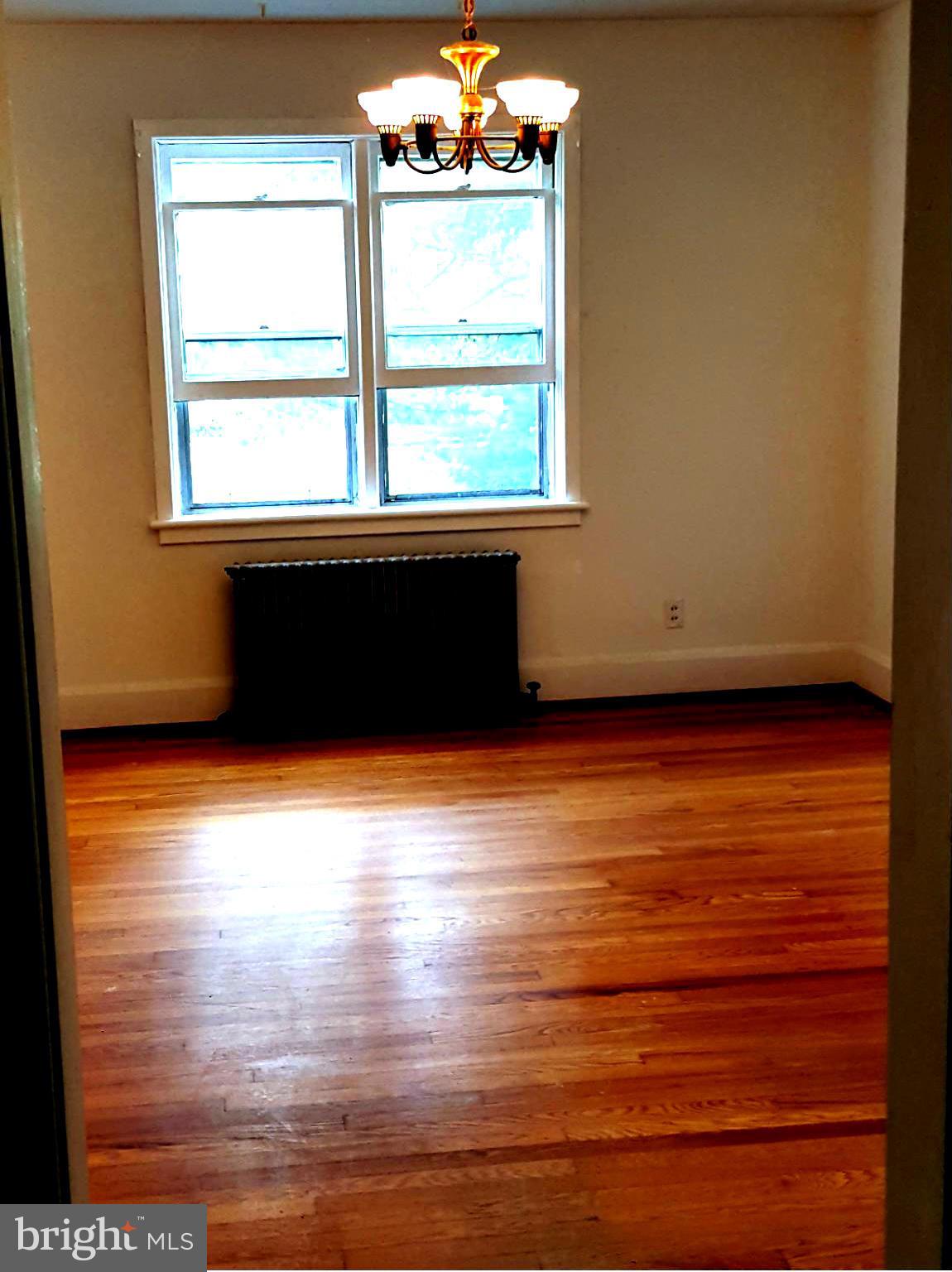4606 Lower Beckleysville Road Hampstead, MD 21074 - Photo 11 of 25 DINING ROOM WITH HARDWOODS