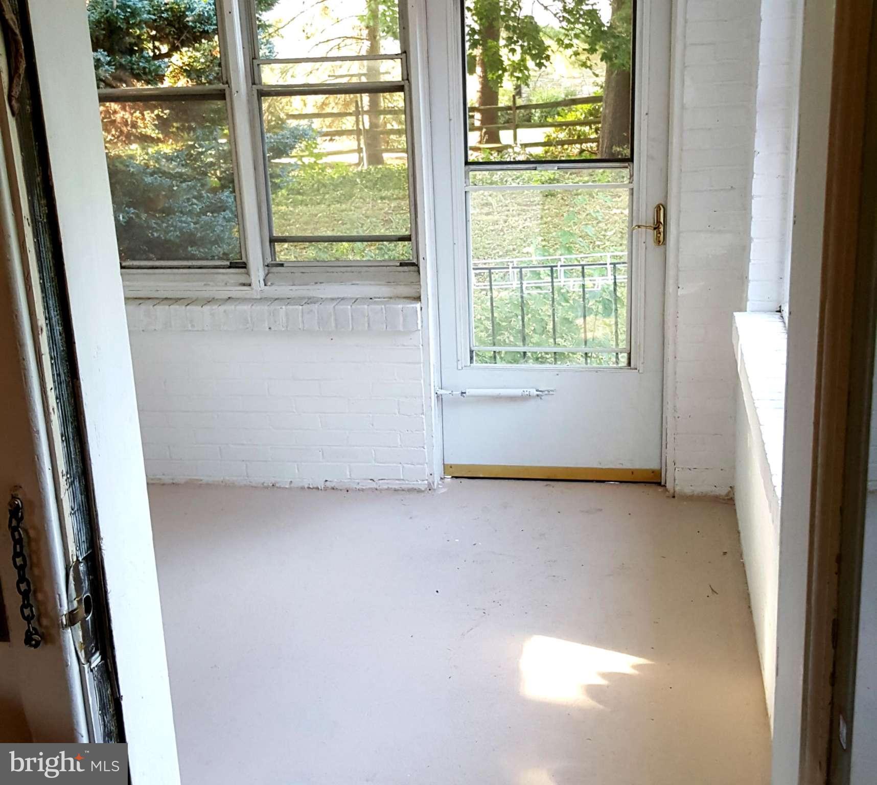 4606 Lower Beckleysville Road Hampstead, MD 21074 - Photo 6 of 25 SUNROOM OFF KITCHEN
