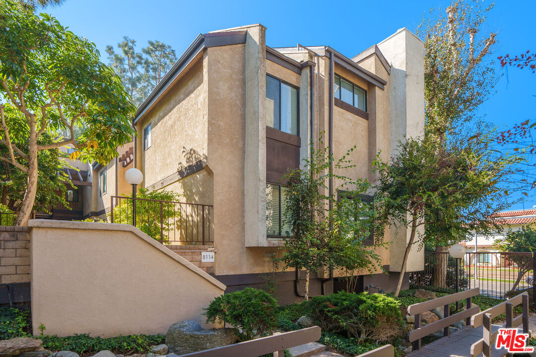 8114 Manitoba Street, Unit 208 Playa del Rey, CA 90293 - Photo 1 of 27 a front view of a house with a garden