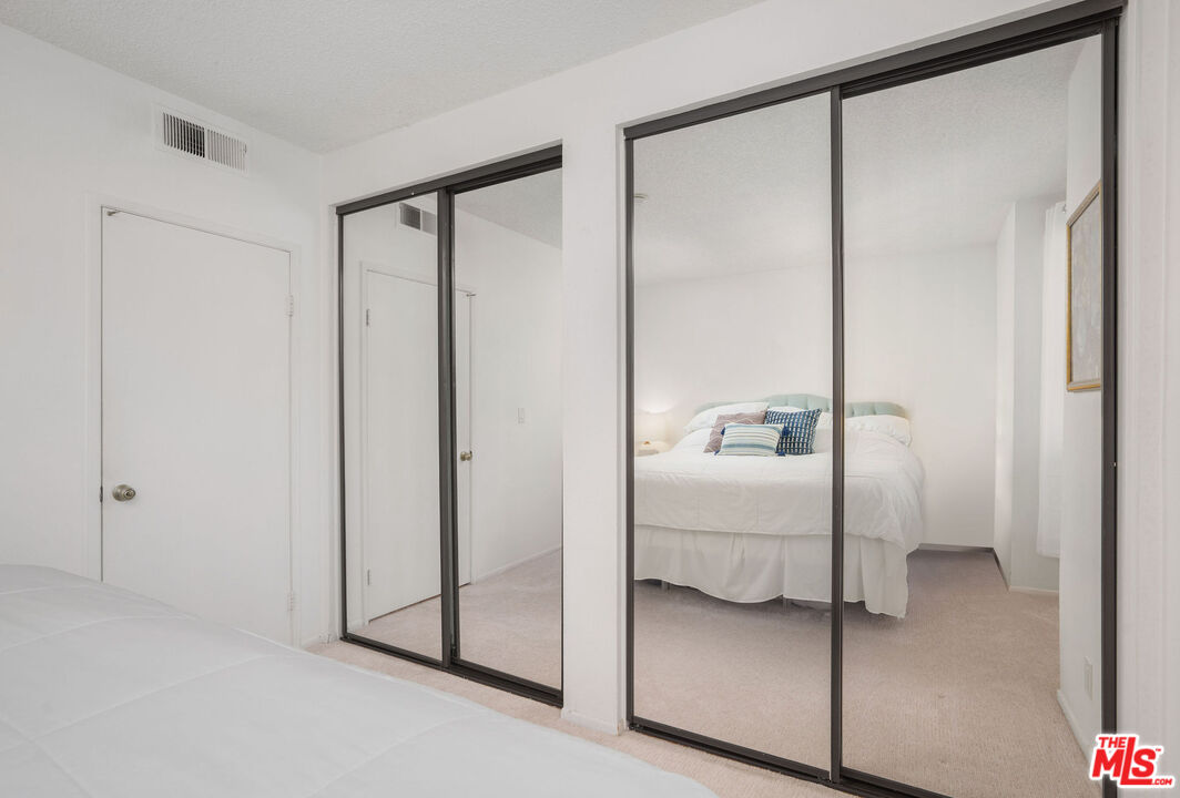 8114 Manitoba Street, Unit 208 Playa del Rey, CA 90293 - Photo 14 of 27 a bathroom with a glass shower door