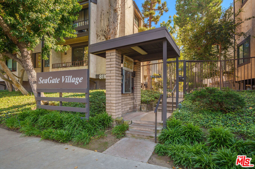 8114 Manitoba Street, Unit 208 Playa del Rey, CA 90293 - Photo 25 of 27 a front view of a house with garden