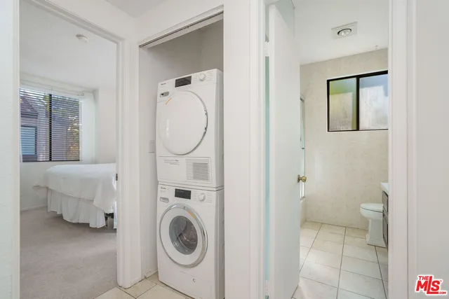 a bathroom with a toilet and a sink