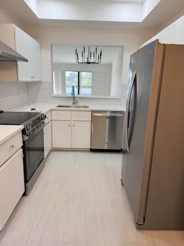 $325,000 | 5021 Oakhill Lane, Unit 123, Delray Beach, FL 33484