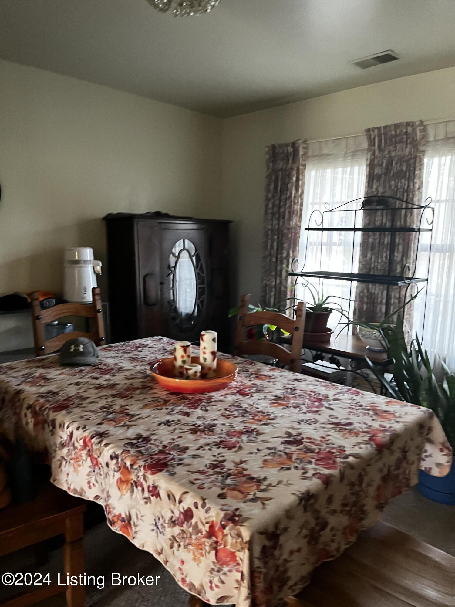 3204 Dundee Road Louisville, KY 40205 - Photo 5 of 29 Dining room is central to home cozy but room to put a large table for entertainment