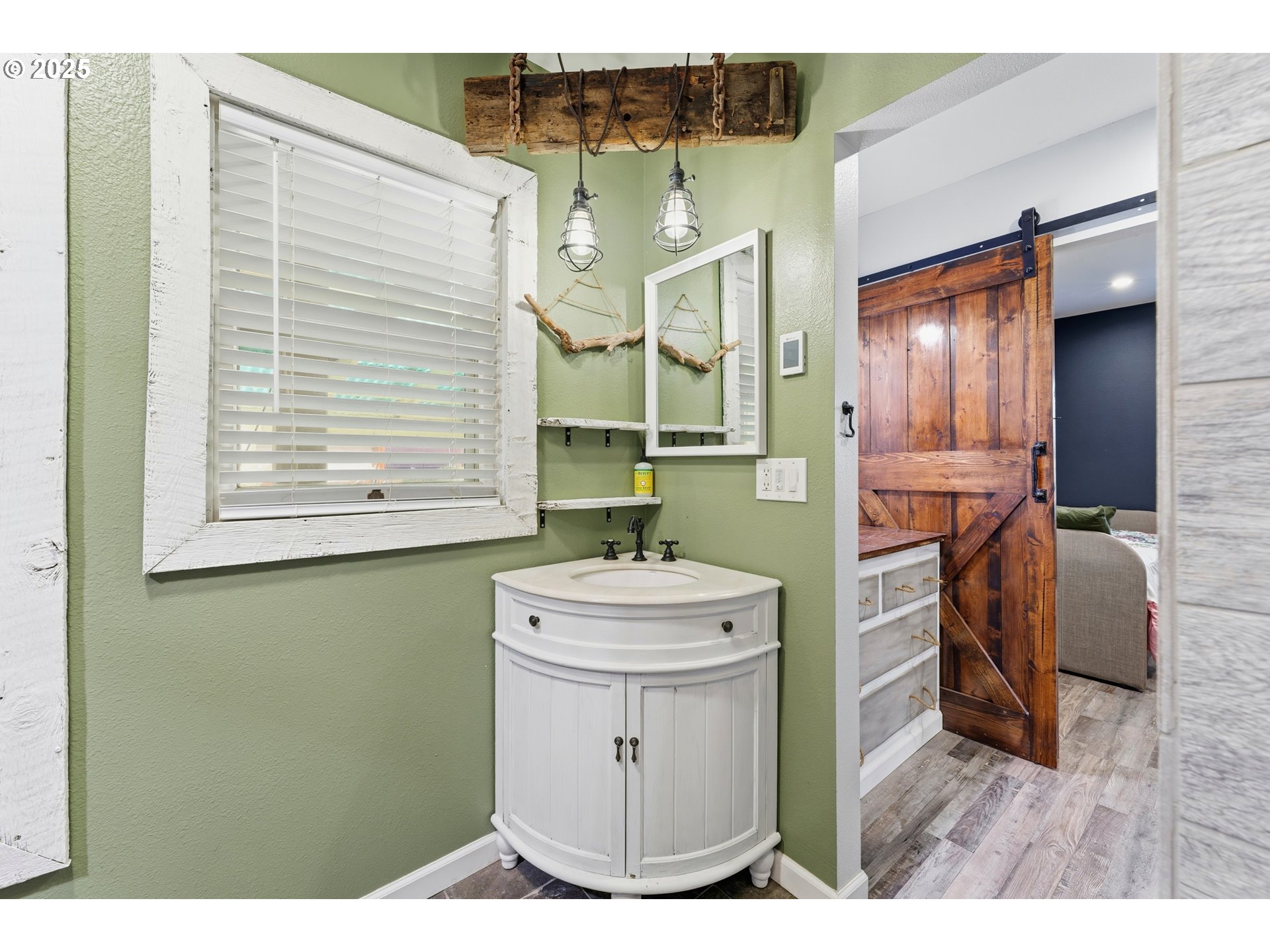 170 Morrison Street Adams, OR 97810 - Photo 13 of 33 a bathroom with a sink a mirror and a window
