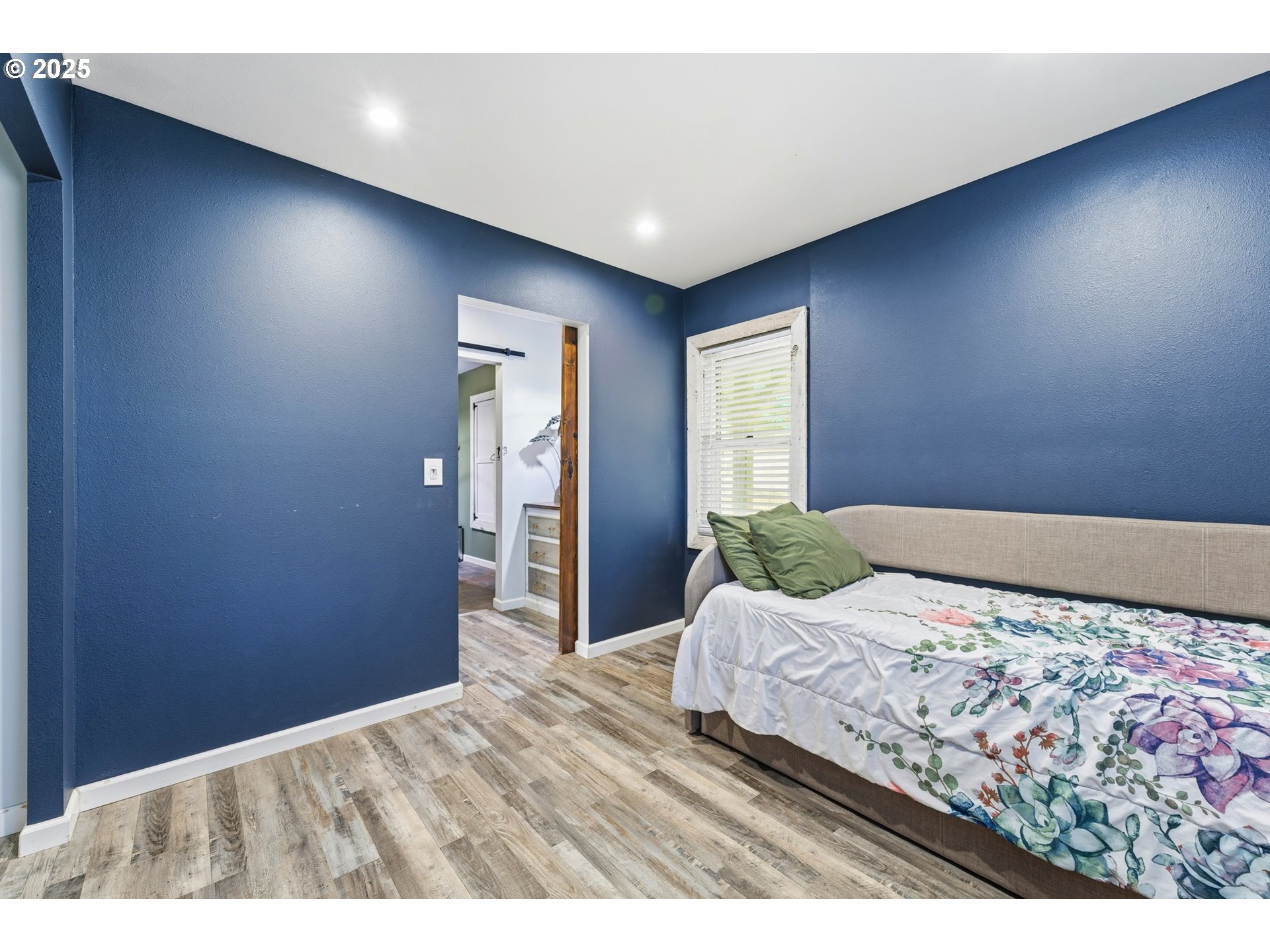 170 Morrison Street Adams, OR 97810 - Photo 16 of 33 a bedroom with a bed and a large mirror