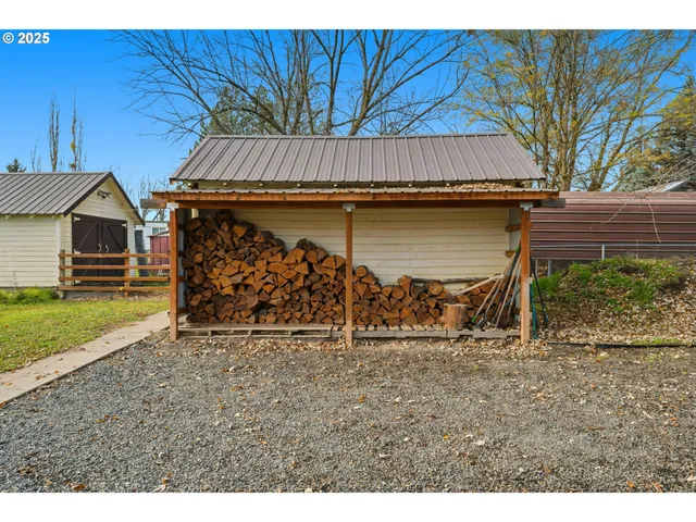 a aerial view of a house with a yard