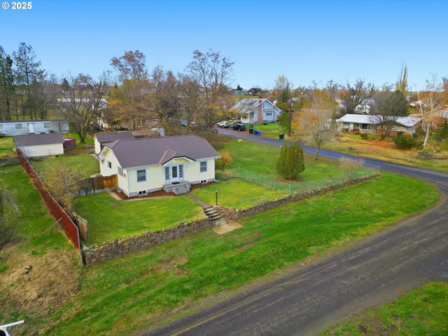 a view of a city with an ocean view