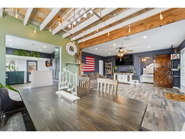 a lobby with furniture and wooden floor