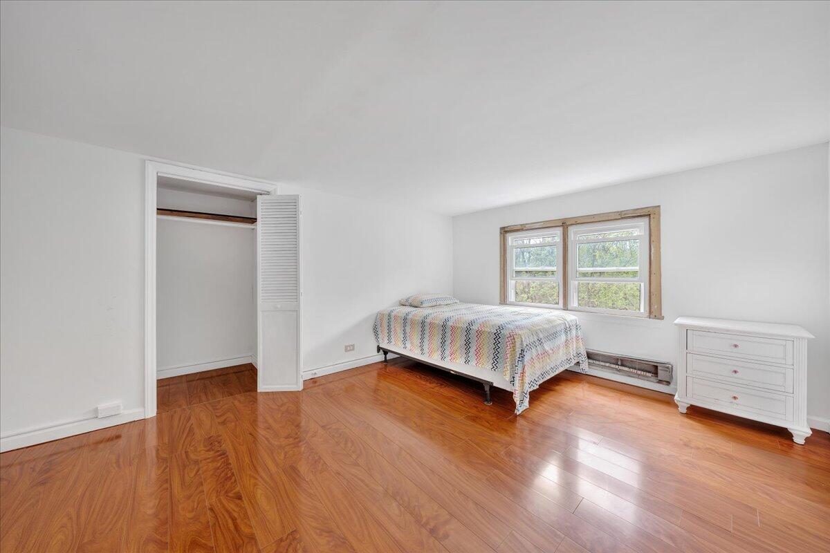 5265 Blue Ridge Boulevard Blue Ridge, VA 24064 - Photo 24 of 40 a bedroom with a bed and a window