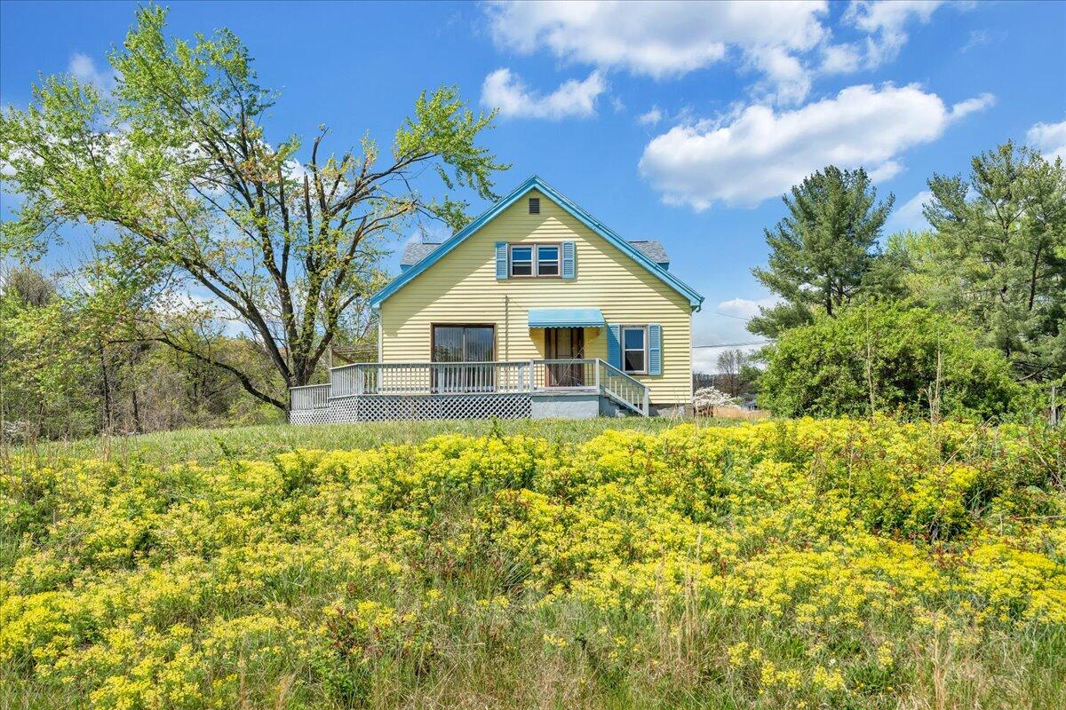 5265 Blue Ridge Boulevard Blue Ridge, VA 24064 - Photo 3 of 40 a house with trees in the background