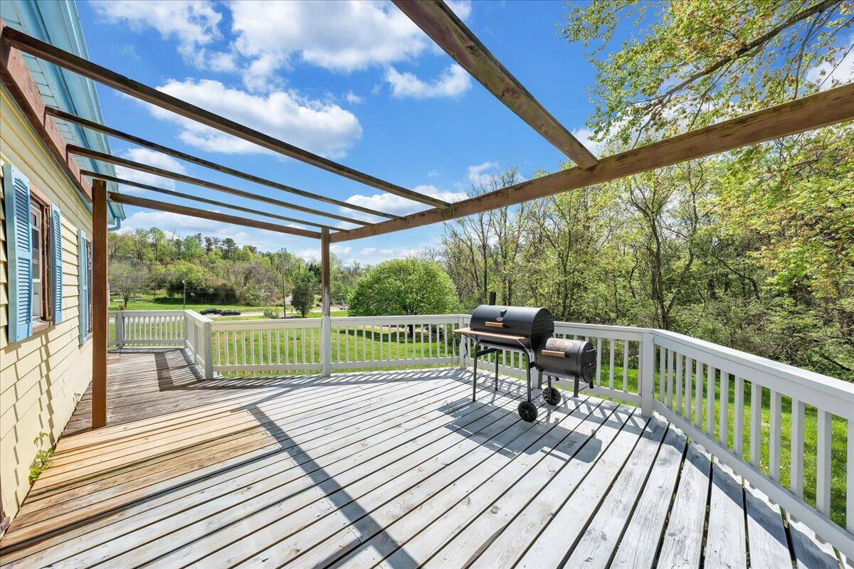 5265 Blue Ridge Boulevard Blue Ridge, VA 24064 - Photo 31 of 40 a view of balcony with furniture and wooden floor