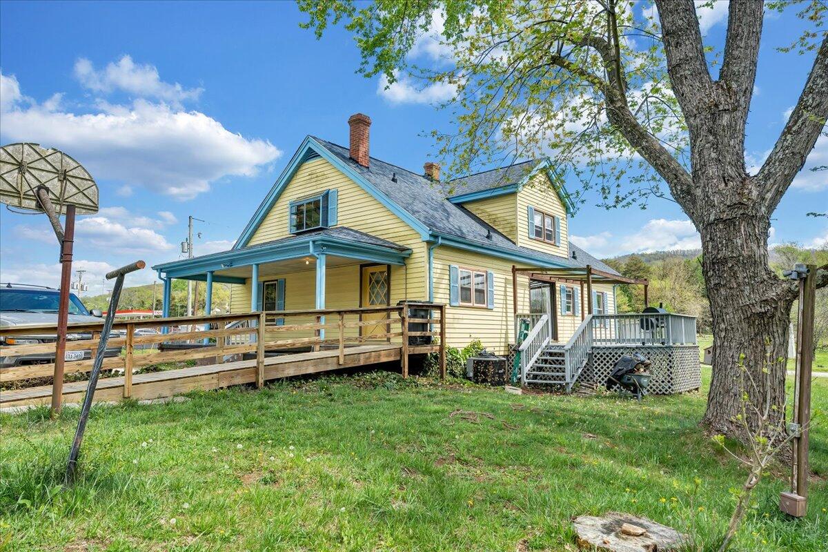 5265 Blue Ridge Boulevard Blue Ridge, VA 24064 - Photo 33 of 40 a front view of a house with a yard