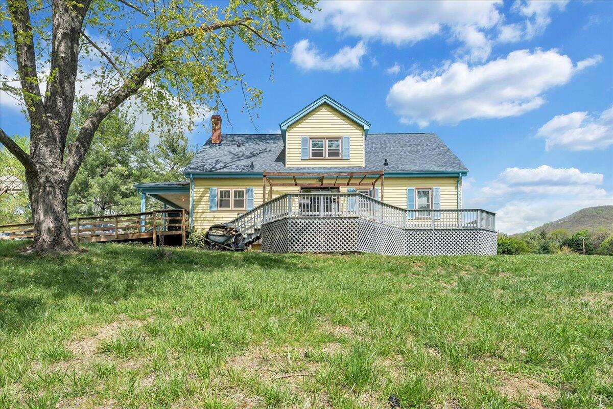 5265 Blue Ridge Boulevard Blue Ridge, VA 24064 - Photo 35 of 40 a front view of a house with garden