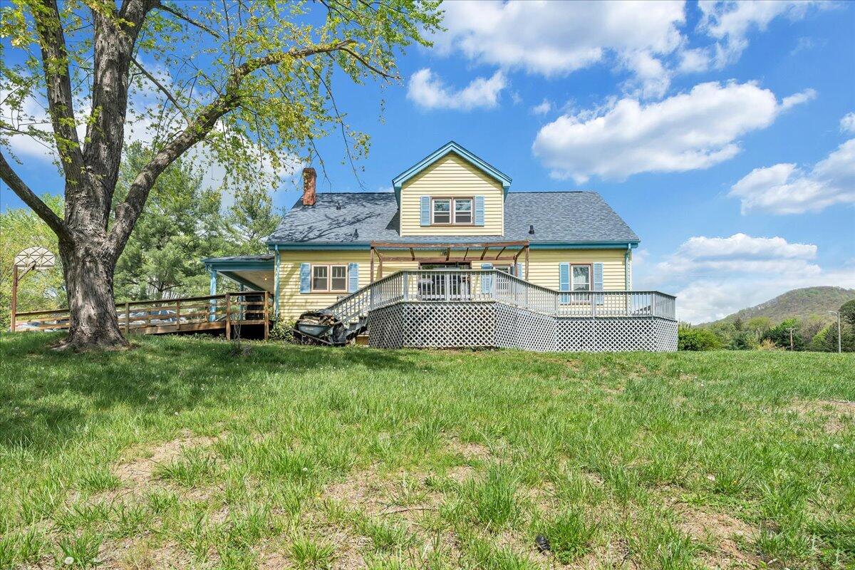 5265 Blue Ridge Boulevard Blue Ridge, VA 24064 - Photo 36 of 40 a front view of a house with a yard
