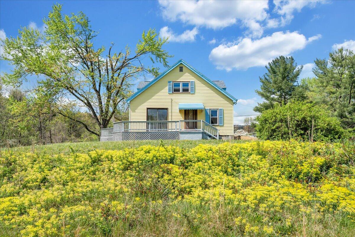 5265 Blue Ridge Boulevard Blue Ridge, VA 24064 - Photo 38 of 40 a house with trees in the background