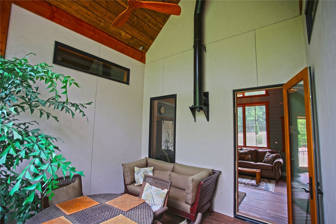 275 Jocassee Lake Road Salem, SC 29676 - Photo 16 of 41 Relax in this inviting outdoor living area with vaulted wood ceilings.