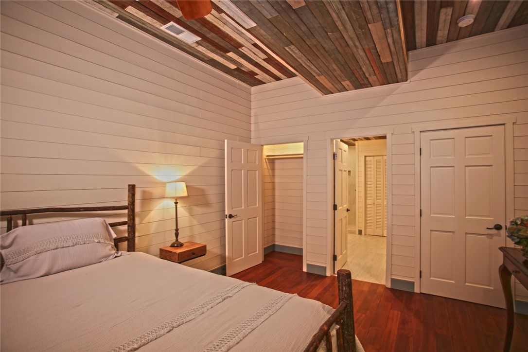 275 Jocassee Lake Road Salem, SC 29676 - Photo 23 of 41 This cozy room offers beautiful hardwood flooring and unique planked ceiling details.