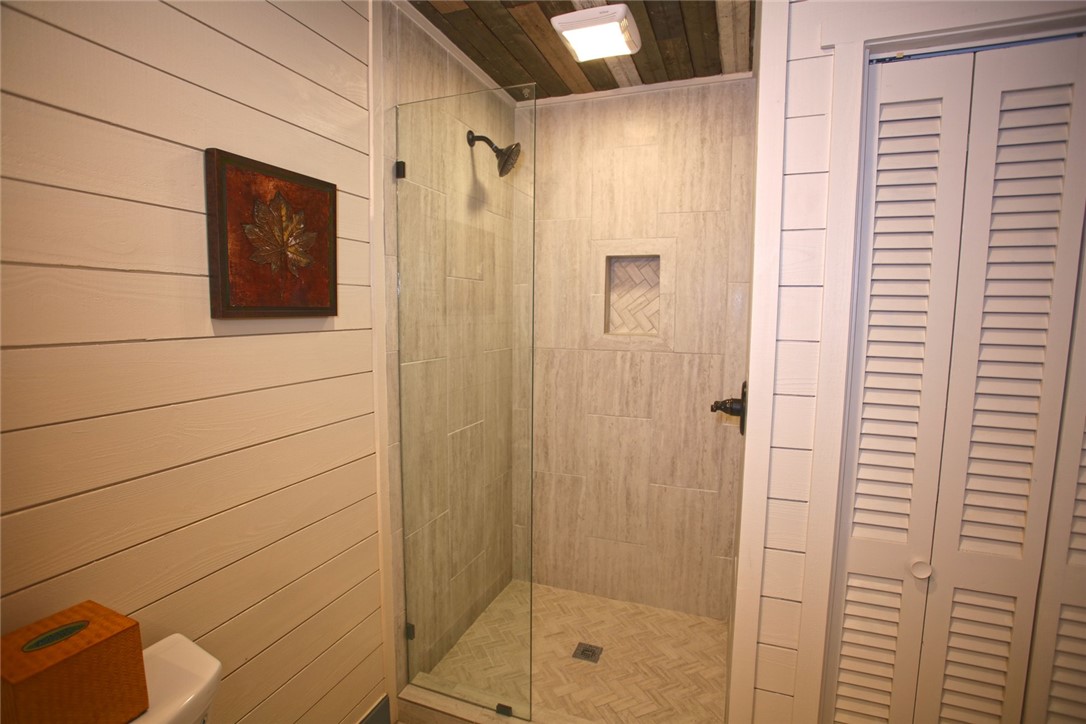 275 Jocassee Lake Road Salem, SC 29676 - Photo 26 of 41 This functional bathroom features a tiled shower with a glass enclosure.
