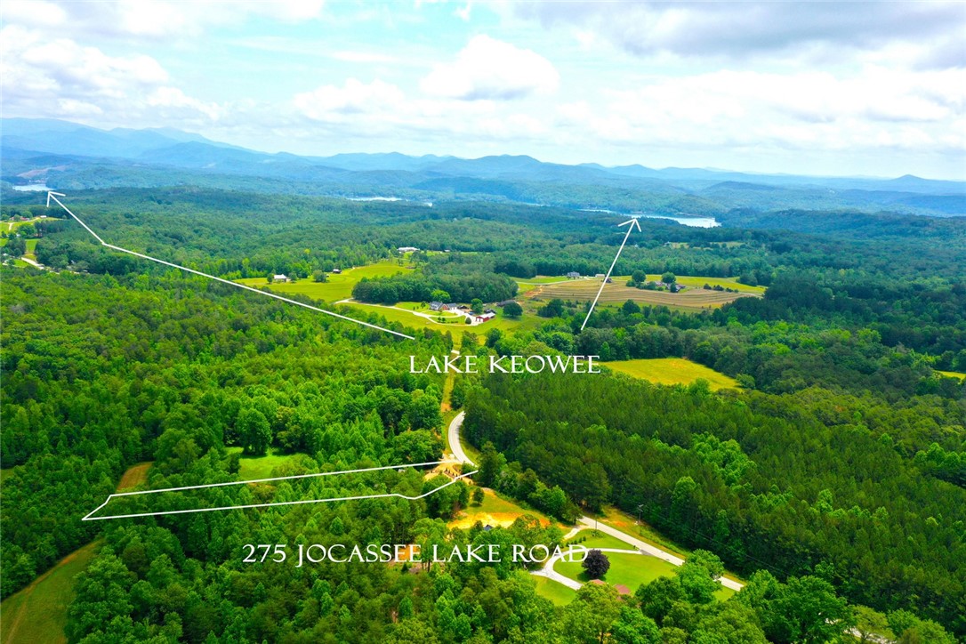 275 Jocassee Lake Road Salem, SC 29676 - Photo 31 of 41 This elevated view captures the extensive land, offering serene lake views and mountainous backdrops.