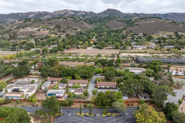 an aerial view of a city with lots of residential buildings