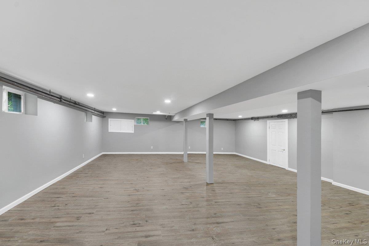 7 Rutledge Road Valhalla, NY 10595 - Photo 30 of 37 Spacious finished lower level featuring recessed lighting, wood-finish flooring, and light gray walls