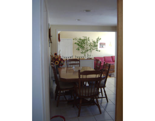 4 Plains Road Ipswich, MA 01938 - Photo 12 of 17 a view of a dining room with furniture and window