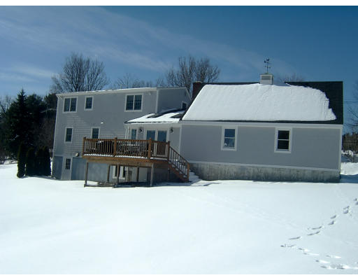 4 Plains Road Ipswich, MA 01938 - Photo 3 of 17 a front view of a house with large trees