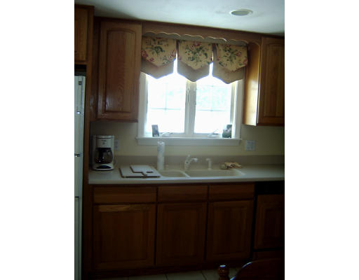 4 Plains Road Ipswich, MA 01938 - Photo 5 of 17 a bathroom with a sink and a mirror