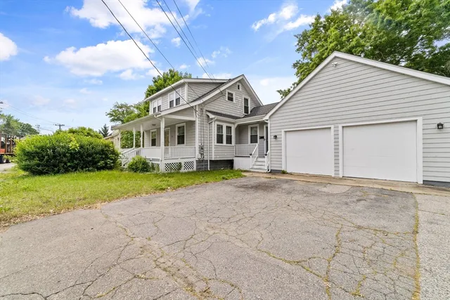 a house view with a garden space