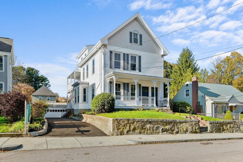 151 Beaver Street, Unit 2 Boston, MA 02136 - Photo 1 of 20 a front view of a house with garden